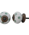 Slick White Ceramic Polka Dot Drawer Knobs 50 Pack Kitchen Cabinet Hardware with green polka dots, 1.5-inch ceramic knobs.