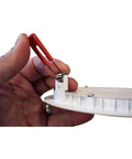 Hand holding spring clip of 6 Inch Recessed LED Wafer Downlight With Ultra Slim Round Trim Switchable Color Temperature 2700K 3000K 3500K 90 CRI Matte Black