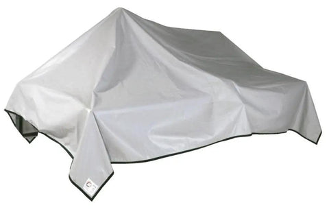 Badass 72 By 112 Inch Machine Cover Built From Tough Cotton Plastisol Fabric, protective cover over machinery at a workshop.