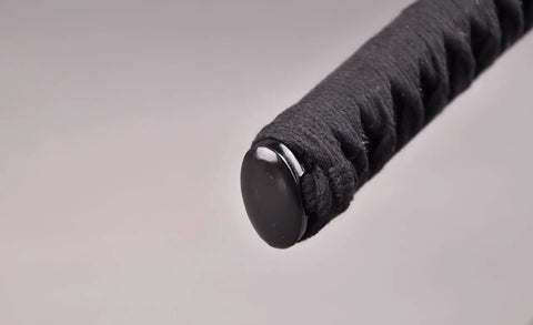 Close-up of handle end of Practice Katana Sword With Full Tang Aluminum Steel Blade Blunt Edge For Safe Iaido Training Japanese Samurai Bushido Style