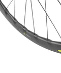 Close-up of Fifty Twenty Five Millimeter Disc Brake Tubeless Wheelset For Road Bike 700c With Special Finish No Logos Carbon Fiber Rim