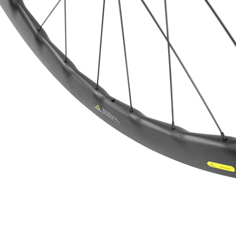 Close-up of Fifty Twenty Five Millimeter Disc Brake Tubeless Wheelset For Road Bike 700c With Special Finish No Logos Carbon Fiber Rim