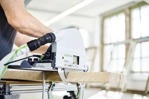 Precision Plunge Saw Featuring Slick Blade Swap Tech And Anti Splinter Guard For Crisp Cuts On Any Build being used on a wooden surface.