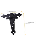 Front view of black wrought-iron strap door hinge with decorative edges; 7.9 in wide by 7.5 in tall for doors/cabinets/sheds.