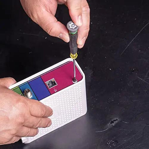 Using Tiny 8 Piece Mini Precision Screwdriver Set For Electronics And Terminal Blocks With Cushion Grip Handles on device