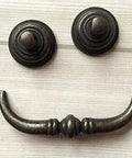 Vintage Look Bail Drawer Pulls Drop Handles 4.25 Inch Center-To-Center Dark Antique Bronze Cabinet Hardware shown on wood surface.
