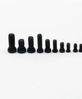 Heavy Duty Alloy Steel Torx Screws Providing Rock Solid Grip And Precision Fitment For Auto Repairs And Industrial Builds That Are Truly Badass And Built To Take A Beating, showing a range of ten black alloy screws in various sizes.