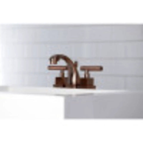 Claremont Mini Widespread Lavatory Faucet with Solid Brass Pop Up in Polished Chrome on white sink