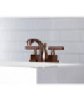 Claremont Mini Widespread Lavatory Faucet With Brass Pop Up Drain Polished Brass Finish shown on bathroom sink