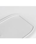 Top Shelf White Plastic Storage Basket With Lidless Opening For Zero Fuss Organization And Straight Up Space Saving Efficiency close-up of smooth white surface.