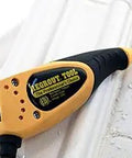 Electric Grout Remover With Pneumatic Action For Quick Regrout removing grout without chipping tiles, yellow, in use on tile joint.