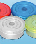 Top view of a 4-piece aluminum flip-off vial caps set for 10ml glass vials; red, blue, white, yellow-green.