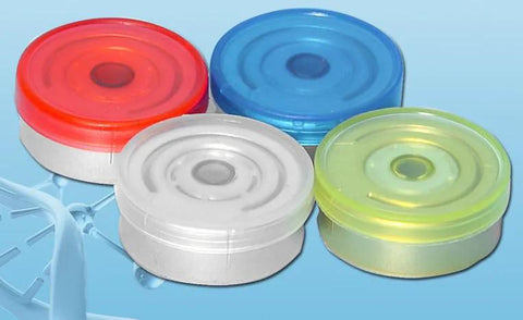 Top view of a 4-piece aluminum flip-off vial caps set for 10ml glass vials; red, blue, white, yellow-green.