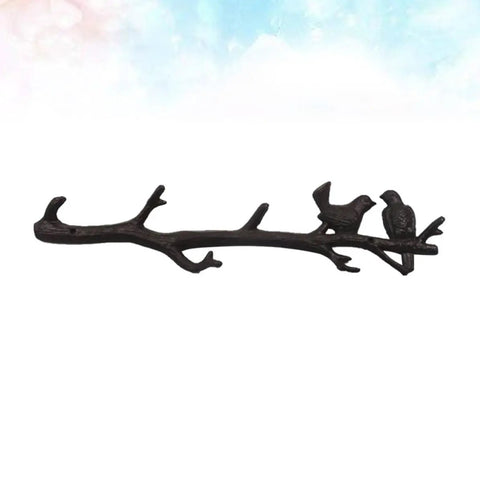 Vintage Cast Iron Tree Branch Coat Hook For Walls And Entryways Bringing Dope Rustic Vibes And Straightforward Storage Solutions That Honestly Upgrade Your Home Decor Setup, featuring bird accents.