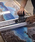 Person using a Slab Jig Router Sled for Woodworking, Level and Trim Wood Slabs Up To 64 Inches Wide on a river table project