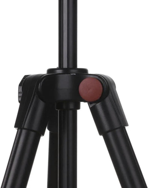 Close-up of a black camera tripod leg joint with a red accent, showcasing stability and design details.