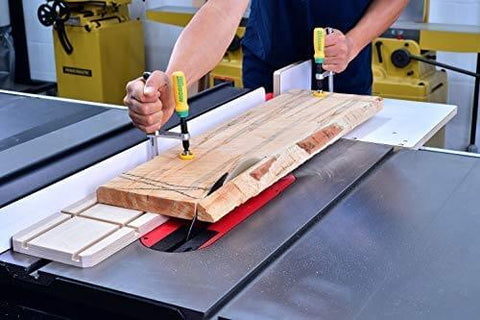 Person using Matchfit Dovetail Clamps Set With Soft Grip Handles Two Piece Two Pack For Precise Routing Fences And Sleds on a workbench.