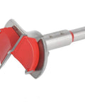Angled view of hinge hole opener drill bit, 35mm carbide-tipped, red adjustable cutter with silver shank