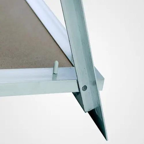 Close-up view of corner detail of Straight Up Solid Aluminum Access Panel 24 By 36 Inch with fixed hinge and latch.