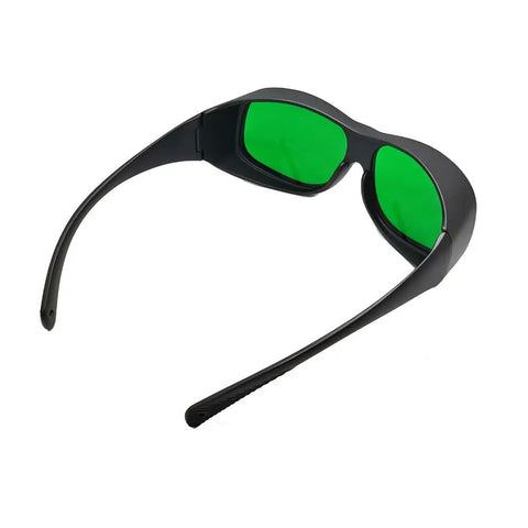 Hella Super Slick Dual Wave Laser Blocking Shades For Red And Infrared Beams Wavelengths Od3 Plus And Od5 Plus, black frame with green lenses.