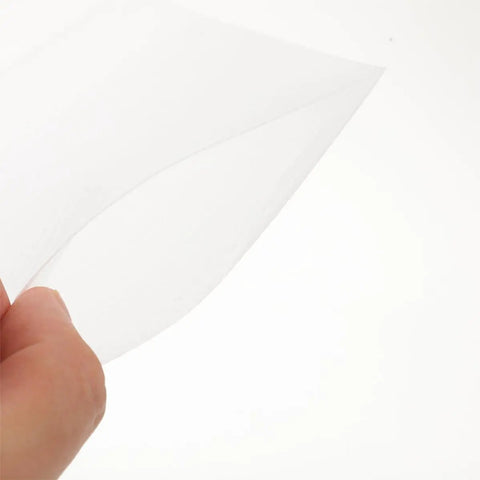 Close-up of a hand holding a 100 Pack White EPE Foam Pouches For Shipping Cushioning And Shockproof Packaging corner against a white background.