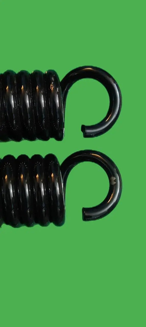 Heavy Hitting Extension Springs Pair Featuring Rock Solid High Tension Steel Construction With 8.5mm Wire Diameter And Secure End Hooks close-up view