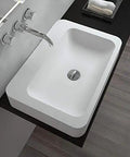 Slick Rectangular Bathroom Vessel Sink Crafted From Heavy Duty Artificial Stone Table Top Basins Featuring Thick Edges That Hold Up Over Years Durable White Countertop Washbasin with modern faucet and sleek design.