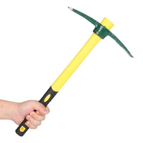 Hand holding Two Piece 18 Inch Pickaxe And Mattock Hoe Set With Fiberglass Handle For Digging Weeding Flower Beds And Camping