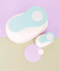 3 Inch Circle Scallop Punch with Easy Lever Press on pastel background, showing scallop cutouts for scrapbooking and paper crafts.