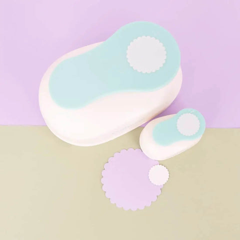 3 Inch Circle Scallop Punch with Easy Lever Press on pastel background, showing scallop cutouts for scrapbooking and paper crafts.