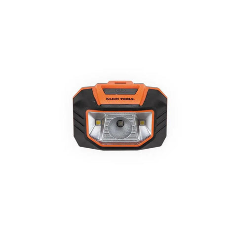 Front view of hard hat headlamp with 45 degree tilt and dual LED flood and spot beams, orange and black design, on white background