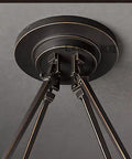 Close-up of the mounting base of the Sharp Retro Industrial Marble Pendant Light Featuring Sleek Candle Design.