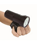 Hand holding 5200 Lumen Narrow Beam Technical Light With Battery Indicator, Push Button Power Levels, Includes Tech Glove