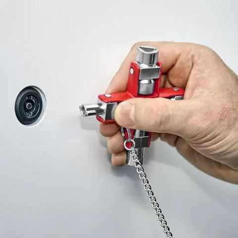 All-In-One Universal Control Cabinet Key With Nine Die-Cast Zinc Profiles unlocking an electrical panel with chain attached
