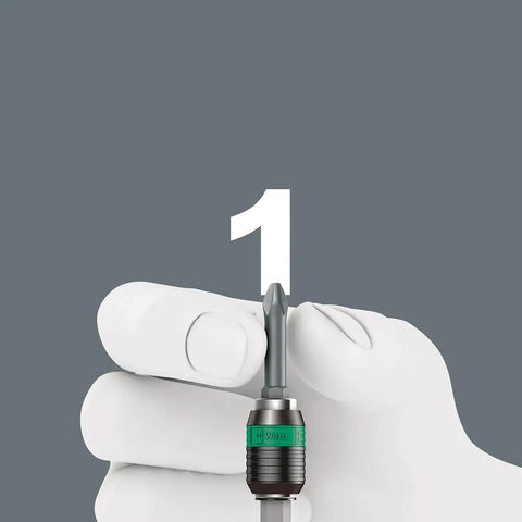 Gloved hand holding Universal Bit Holder With 1/4 Inch By 75 mm Shaft, One Hand Bit Change, Quick Spin Chuck.