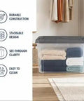 Tackle The Mess Fast With This Beast Mode 108 Quart Stackable Storage Bin Packing Dang Solid Snap Latches And Crisp Clear Plastic For Foolproof Closets And Garage Decluttering, filled with neatly folded blankets.
