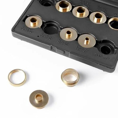 Top view of brass router template bushing set, 10 pieces in a black plastic case; Porter-Cable RA02 style