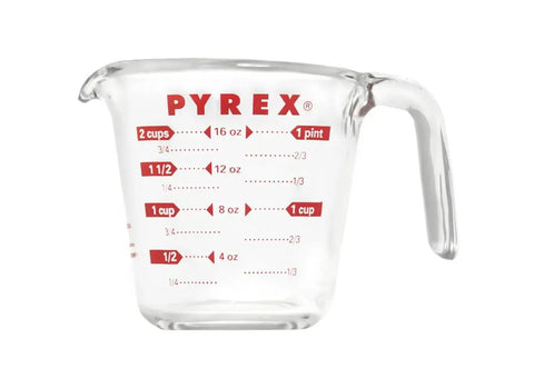 Prepware Glass Measuring Cup With Red Graphics, Clear, Non Porous Glass That Won't Stain Or Retain Odors, Microwave Safe, Oven Safe, And Dishwasher Safe, Great For Quick, Mess Free Kitchen Metrics. 2-cup glass measuring cup, red markings, side view