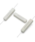 Angled front view of four white cement power resistors marked 10 ohm 10 W with axial leads.
