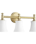 Transitional Three Light Vanity Light From Rossington Collection In Aged Brass Finish With Satin Opal Glass Damp Rated