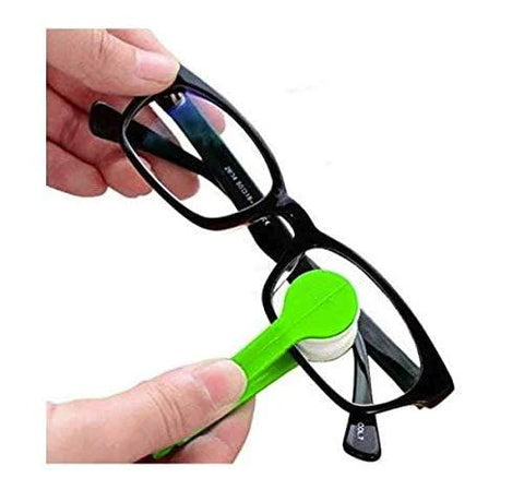 Green mini eyeglasses cleaning tool with microfiber pad cleaning black rectangular glasses