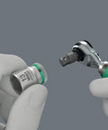 Zyklop Mini 4 Bit Ratchet One Quarter Inch Drive Fifty Millimeter Hex Bit Holder direct take up grip in hands close-up