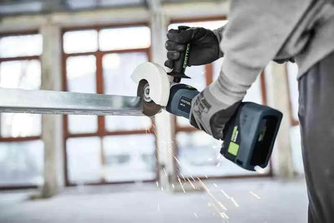 Heavy Hitter Angle Grinder Mounting Rack Supporting 18V Tools At 8500 RPM includes angle grinder cutting metal with protective guard.