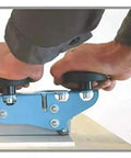 Beefy Professional Grade Large Format Panel Tile Cutter Up To 130 Inches Long With Scratch Resistant Rubber Bed being operated by hands.