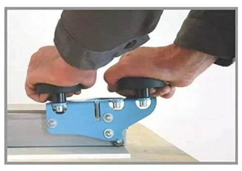 Beefy Professional Grade Large Format Panel Tile Cutter Up To 130 Inches Long With Scratch Resistant Rubber Bed being operated by hands.
