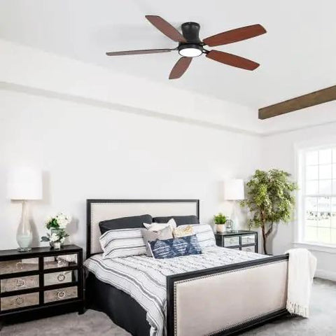 Bayfeve 52-Inch Flush-Mount Ceiling Fan with Light (Black + Plywood) in a modern bedroom setting with a bed and decorative lamps.