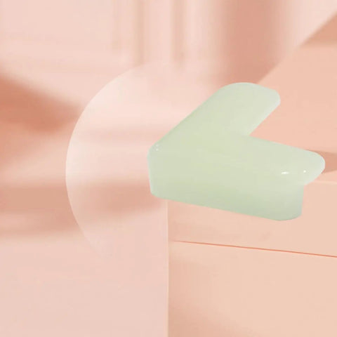 Close-up of a light green PVC corner guard showing its non-slip surface for safe furniture edges with double-sided adhesive, 10 pack.