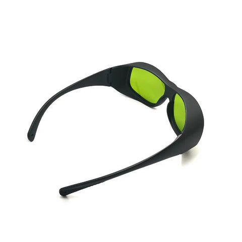 Professional Laser Safety Glasses Provide Beefy OD5 Protection For 660Nm And 800 To 1095Nm Erbium Systems featuring green lenses.