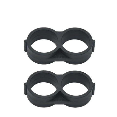 Close-up of two black plastic Twenty Pcs Three Quarter Inch Drip Irrigation End Cap Plugs Universal Fit Tight Seal Built To Last End