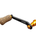 Premium Single Rocker Fishing Reel Handle With Rubber Cork Knob Carbon Fiber Core 70Mm Screw In Arm Length showing black and cork design.
